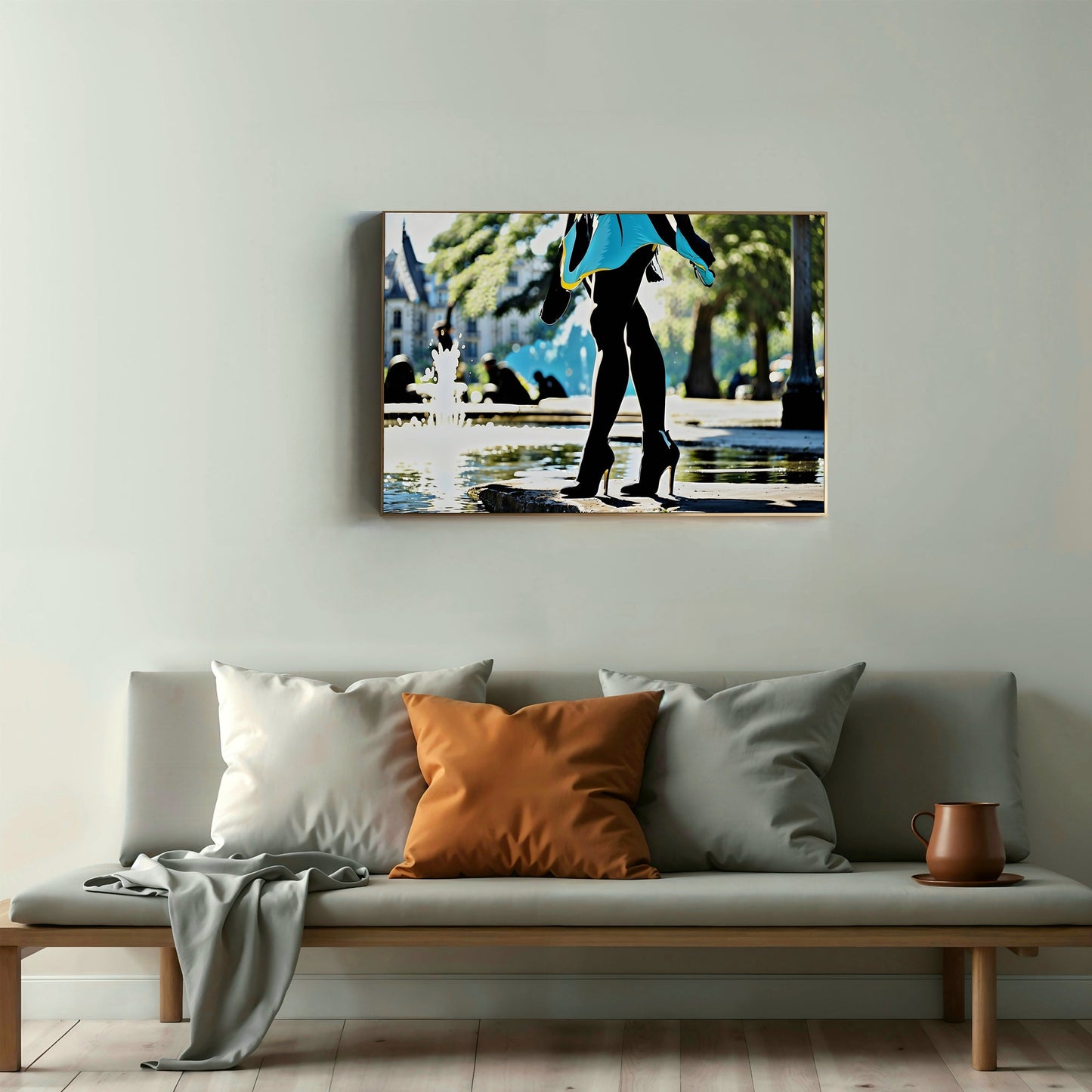 City Park Silhouette | Elegant Woman with Blue Skirt and High Heels by Fountain | Striking Urban Art | 100 x 70 cm - Arts To GloryCity Park Silhouette | Elegant Woman with Blue Skirt and High Heels by Fountain | Striking Urban Art | 100 x 70 cmColourful ExpressionsArts To GloryContemporary living room with a large digital art print above a sofa, featuring a silhouette of a woman in a blue skirt and high heels by a city park fountain.