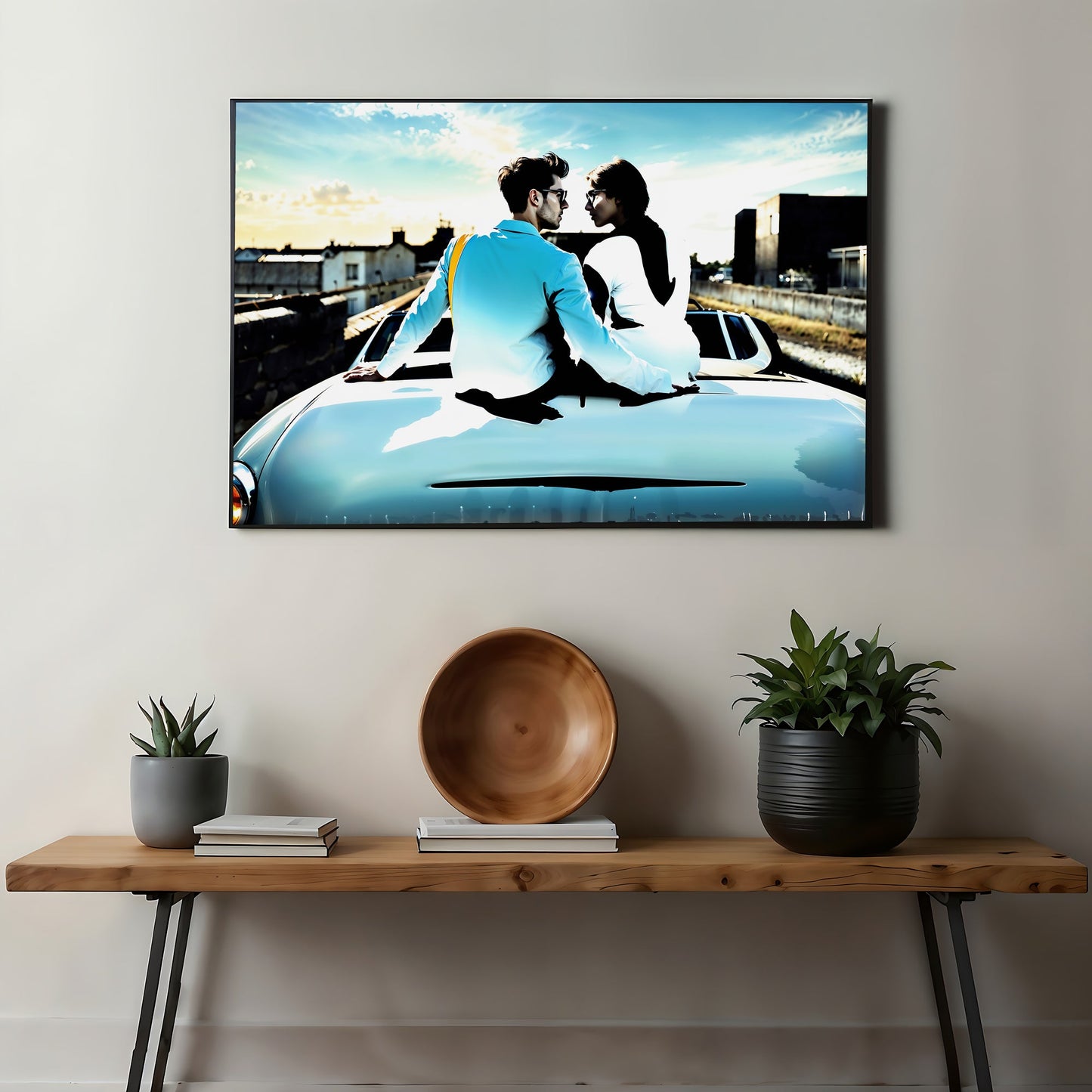 Couple on Convertible | Romantic Urban Reflection Art | Blue and White Accents | Modern Digital Art | 100 x 70 cm | Home Decor | Instant Download - Arts To GloryCouple on Convertible | Romantic Urban Reflection Art | Blue and White Accents | Modern Digital Art | 100 x 70 cm | Home Decor | Instant DownloadBlueArts To GloryFramed wall art of a romantic couple sitting on the back of a blue convertible car, displayed above a wooden console table with decorative items, and featuring a city reflection