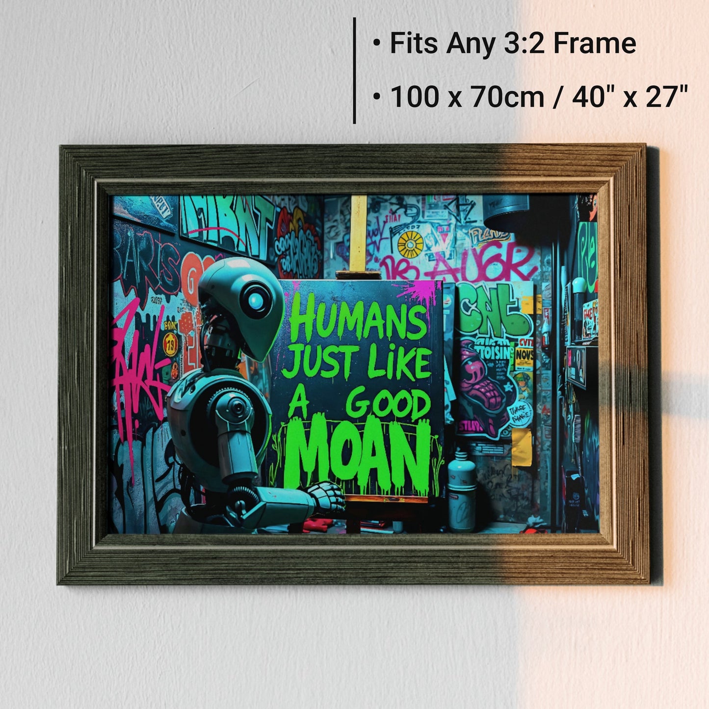 Humans Just Like A Good Moan - Arts To GloryHumans Just Like A Good MoanDigital Wall ArtArts To GloryFramed graffiti - style artwork featuring a robot painting bold green text with a playful phrase, perfect for industrial and urban home décor.