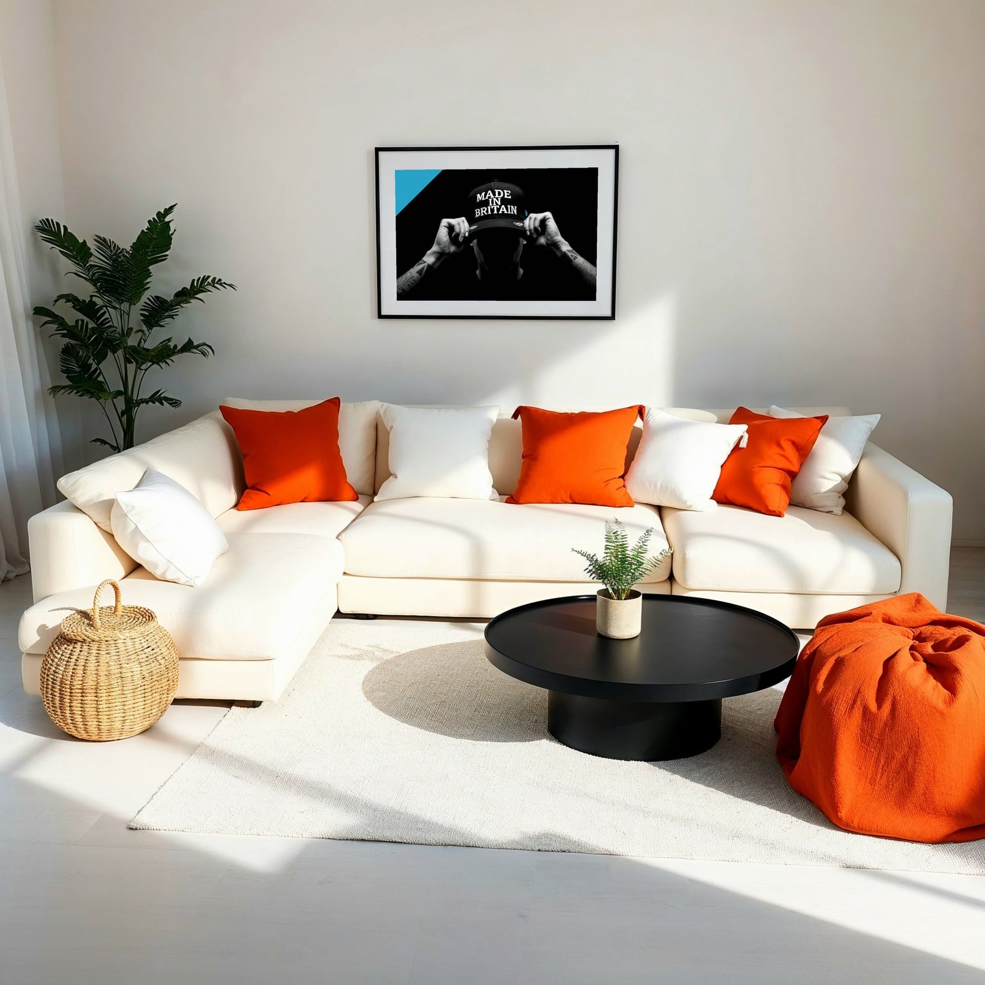 Made In Britain - Arts To GloryMade In BritainDigital Wall ArtArts To GloryA bright, minimalist living room featuring a cream sofa, wooden accents, and a framed Made in Britain print on a dark wall.