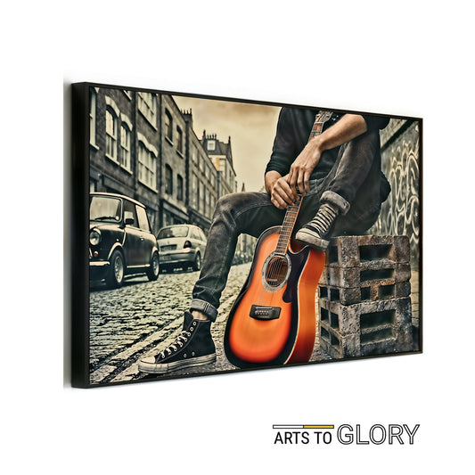 Man with Orange Guitar - Urban Street Scene Digital Art - Arts To GloryMan with Orange Guitar - Urban Street Scene Digital ArtDigital Wall ArtArts To GloryUrban street scene featuring a man with a bold orange guitar, perfect for modern interiors. 100x70cm.