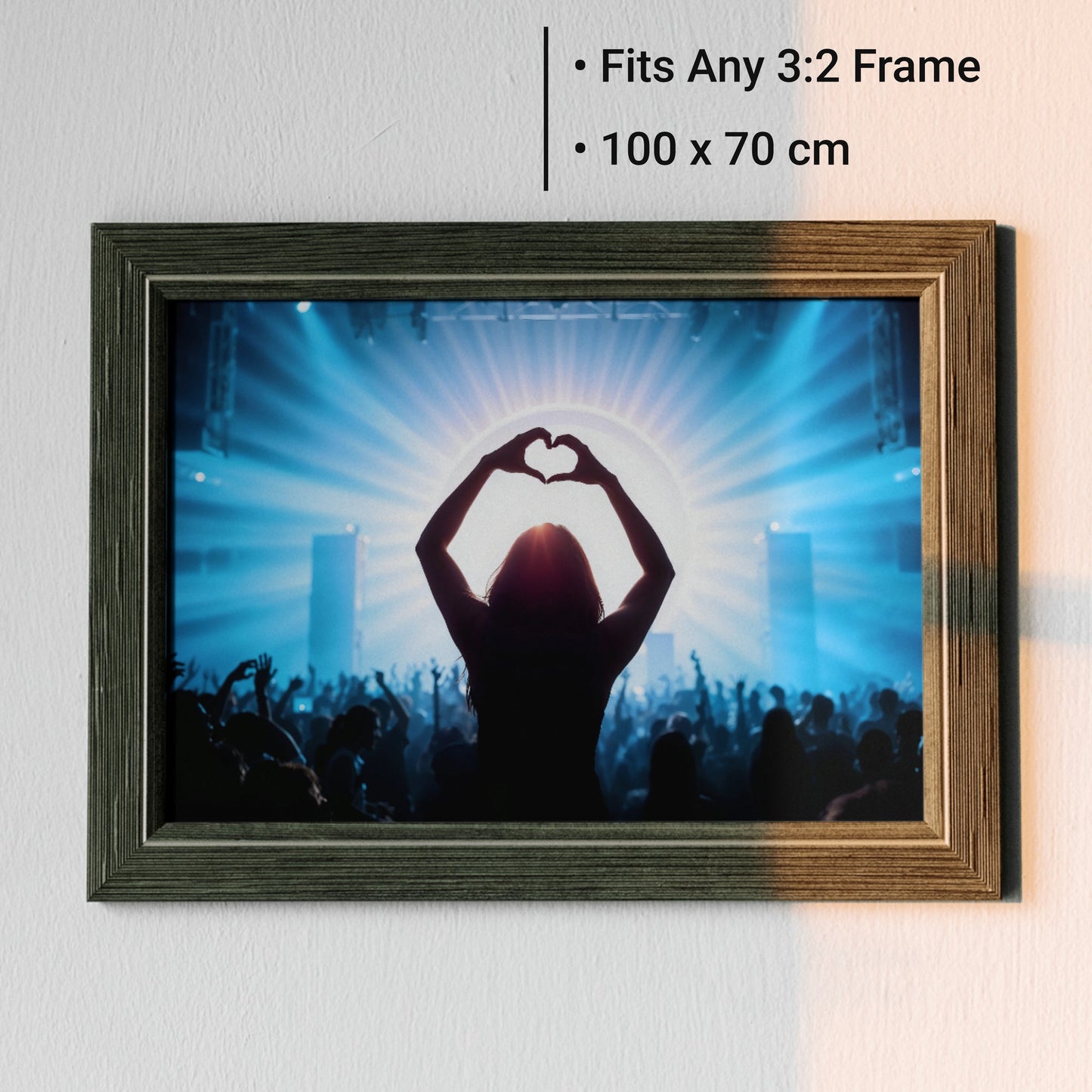 Music Festival Heart Silhouette - Arts To GloryMusic Festival Heart SilhouetteDigital Wall ArtArts To GloryFramed 100x70cm print of a festival silhouette with blue light and heart gesture, ideal for contemporary and urban interiors.