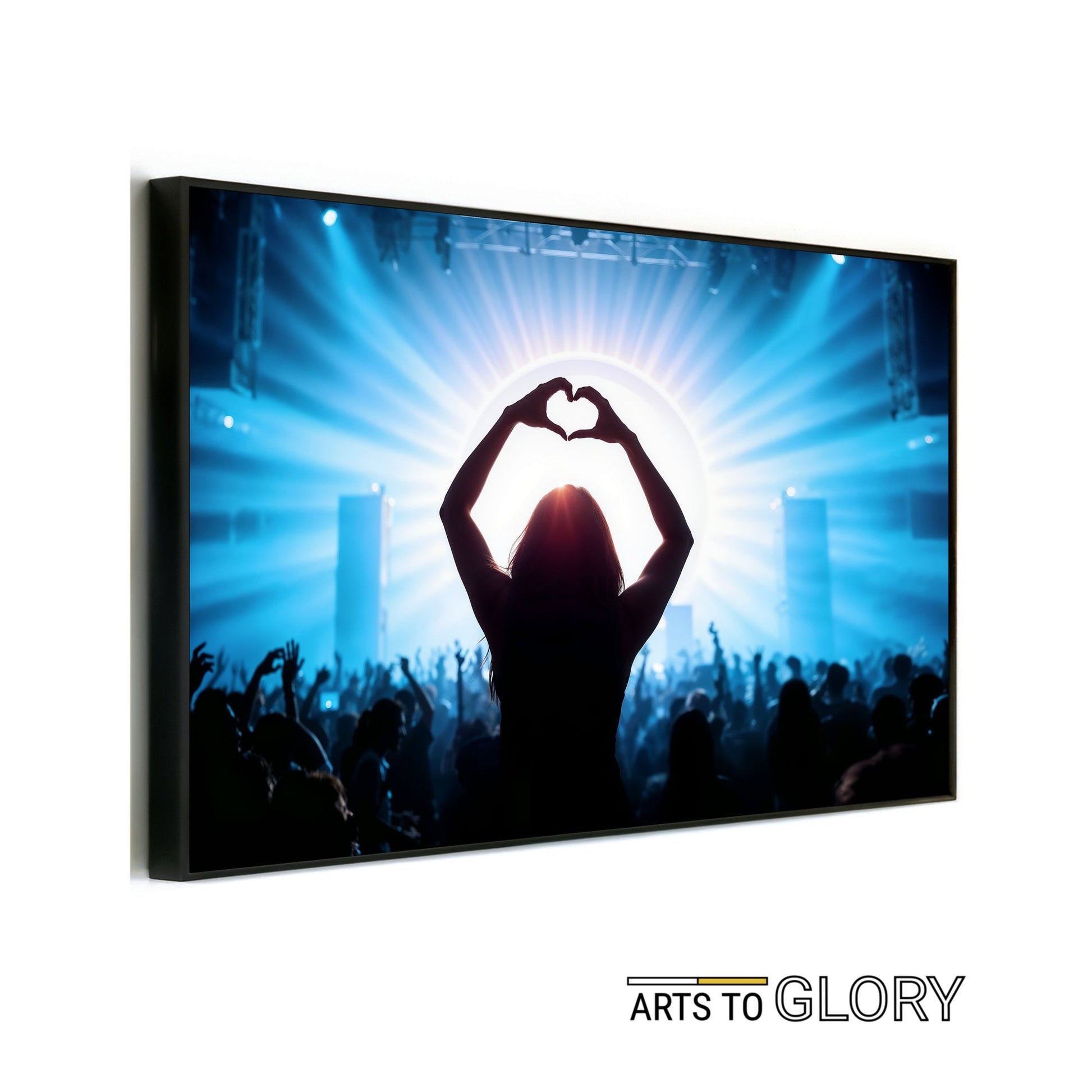 Music Festival Heart Silhouette - Arts To GloryMusic Festival Heart SilhouetteDigital Wall ArtArts To GlorySilhouette art of a person making a heart gesture at a music festival, with radiant blue light beams, perfect for modern urban interiors.