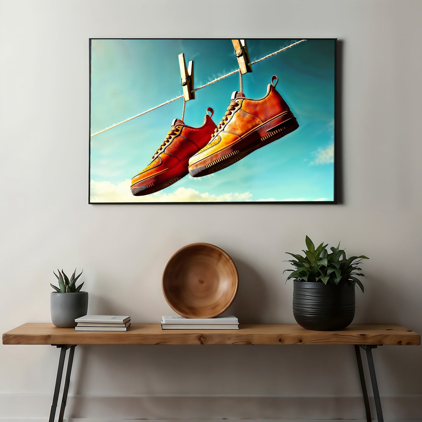 Orange Footwear Hanging from Line - Arts To GloryOrange Footwear Hanging from LineDigital Wall ArtArts To GloryContemporary digital artwork featuring orange sneakers hanging from a washing line, contrasting with a bright blue sky, 100x70cm.