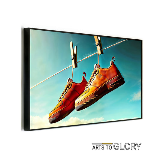 Orange Footwear Hanging from Line - Arts To GloryOrange Footwear Hanging from LineDigital Wall ArtArts To GloryDigital artwork featuring bold orange sneakers pegged to a washing line against a blue sky, perfect for modern interiors. 100x70cm.