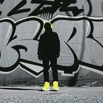 Video - Silhouette Streetwear - Arts To Glory. Silhouette Streetwear. Digital Wall Art Arts To Glory. Urban - style digital artwork featuring a bold silhouette in yellow footwear and headphones on a gritty street.