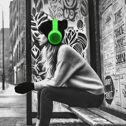Video showcasing a close-up view of the digital artwork, focusing on the woman with green headphones at a graffiti-covered bus stop, highlighting the contrast of vivid green against a monochrome cityscape.