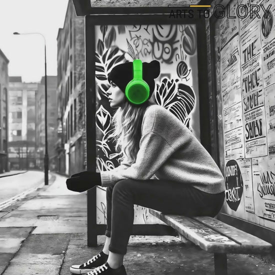 Video showcasing a close-up view of the digital artwork, focusing on the woman with green headphones at a graffiti-covered bus stop, highlighting the contrast of vivid green against a monochrome cityscape.