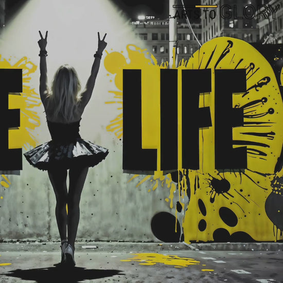 Zoom-in video of the "Live Life" motivational art piece featuring a woman in a tutu making peace signs, with bold black and yellow splashes, Arts to Glory.