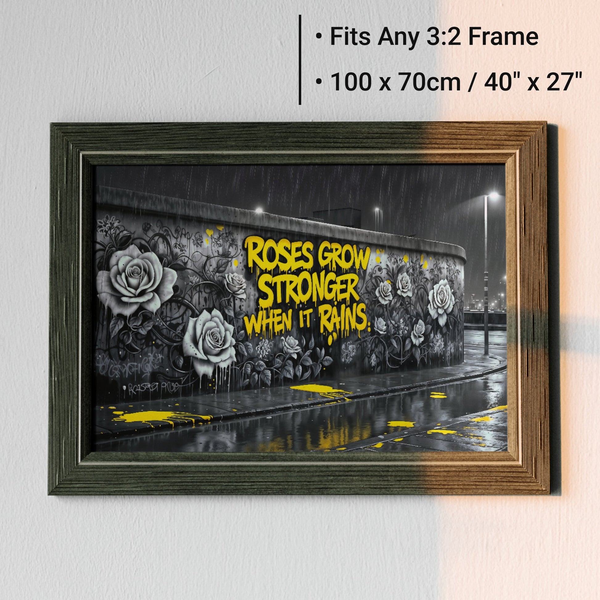 Roses Grow Stronger | Inspirational Graffiti Wall Art | Digital Download | 100 x 70 cm - Arts To GloryRoses Grow Stronger | Inspirational Graffiti Wall Art | Digital Download | 100 x 70 cmTextual NarrativesArts To GloryUrban framed wall art showcasing bold yellow graffiti text with rose elements in a monochromatic cityscape, designed to fit any 3:2 frame, 100x70cm, ideal for modern home décor.