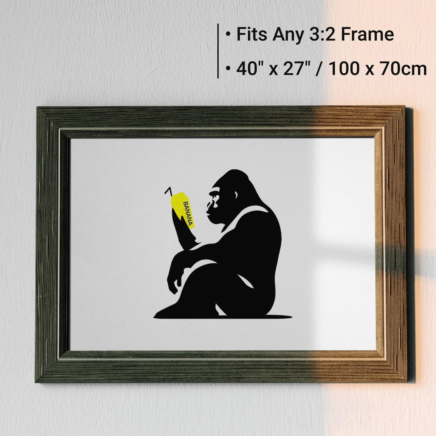 Staring Ape with Yellow Milkshake | Primal Contemplation Wall Art | Minimalist Design | Black & White Decor with a Pop of Colour | Home Decor | Digital Download | 100 x 70 cm - Arts To GloryStaring Ape with Yellow Milkshake | Primal Contemplation Wall Art | Minimalist Design | Black & White Decor with a Pop of Colour | Home Decor | Digital Download | 100 x 70 cmSimple & StrikingArts To GloryBlack and wood-framed art print of a gorilla with a yellow banana milkshake, suitable for any 3:2 frame, s