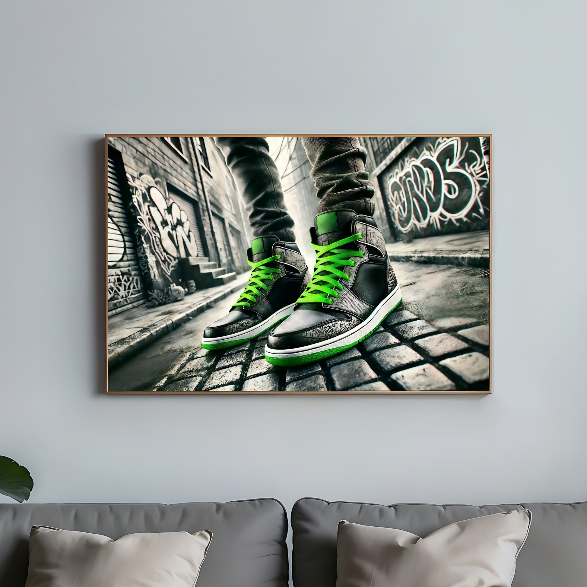 Trainers with green laces set in a graffiti-covered alleyway, showcasing urban style.