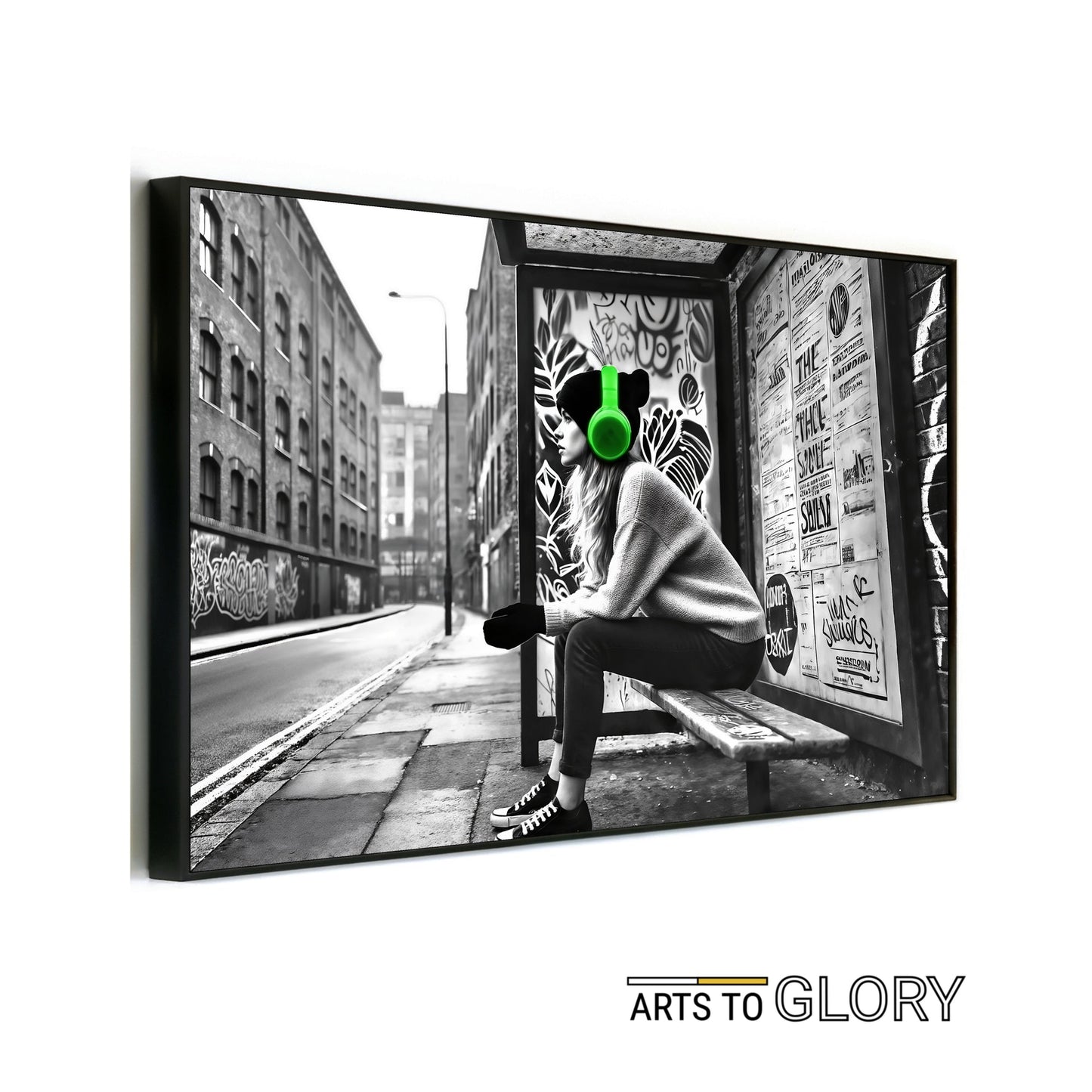 Woman Wearing Green Headphones at Bus Stop - Arts To GloryWoman Wearing Green Headphones at Bus StopDigital Wall ArtArts To GloryDigital artwork of a woman wearing green headphones sitting at a graffiti - covered bus stop in a monochrome cityscape, 100x70cm.