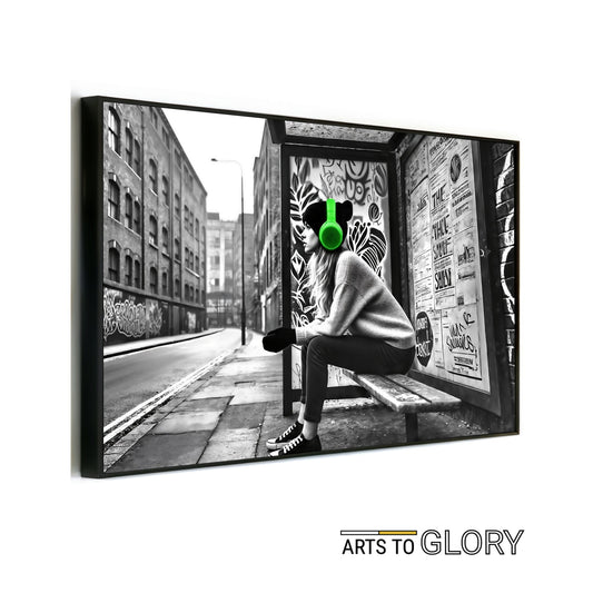 Woman Wearing Green Headphones at Bus Stop - Arts To GloryWoman Wearing Green Headphones at Bus StopDigital Wall ArtArts To GloryDigital artwork of a woman wearing green headphones sitting at a graffiti - covered bus stop in a monochrome cityscape, 100x70cm.