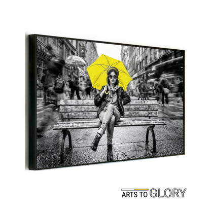 Yellow Umbrella Portrait - Arts To GloryYellow Umbrella PortraitDigital Wall ArtArts To GloryMock - up of yellow umbrella held by a resilient figure on a city bench amid monochrome motion blur, framed and angled clearly with Arts To Glory branding.